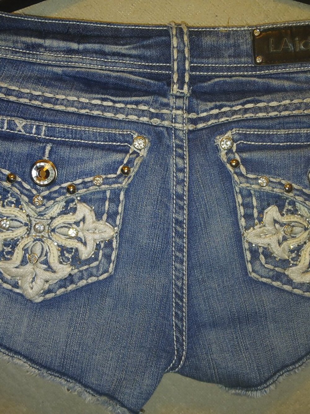 Jean shorts with diamond accents